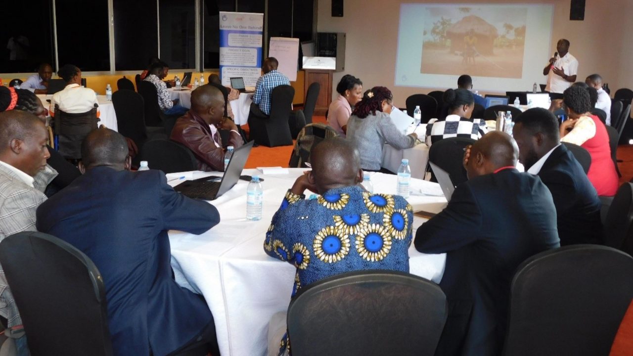 Photo of the project national level kick-off workshop. Participants listening a presentation.