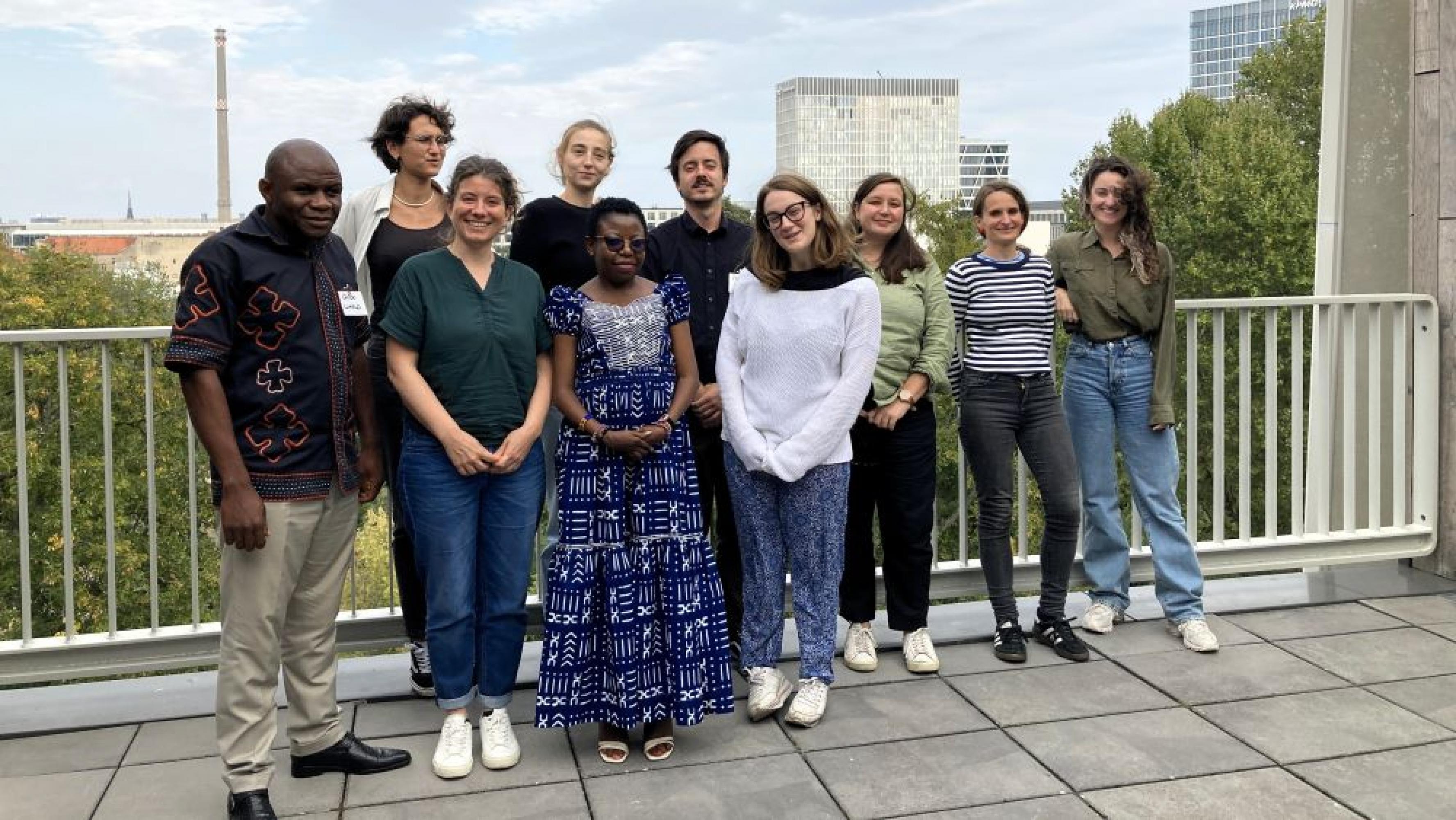 A group of participants standing on the terrace of the training venue.
