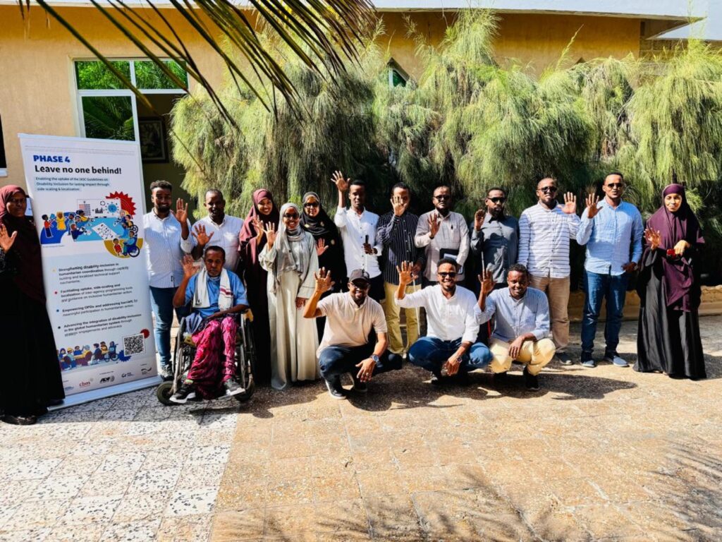 Participants and facilitators pose for a group photo during the LNOB Phase 4 project kick-off events held on 30th June 2025 in Mogadishu, Somalia, © [Mohamoud Mohamed- Co-facilitator’s Personal Support]
