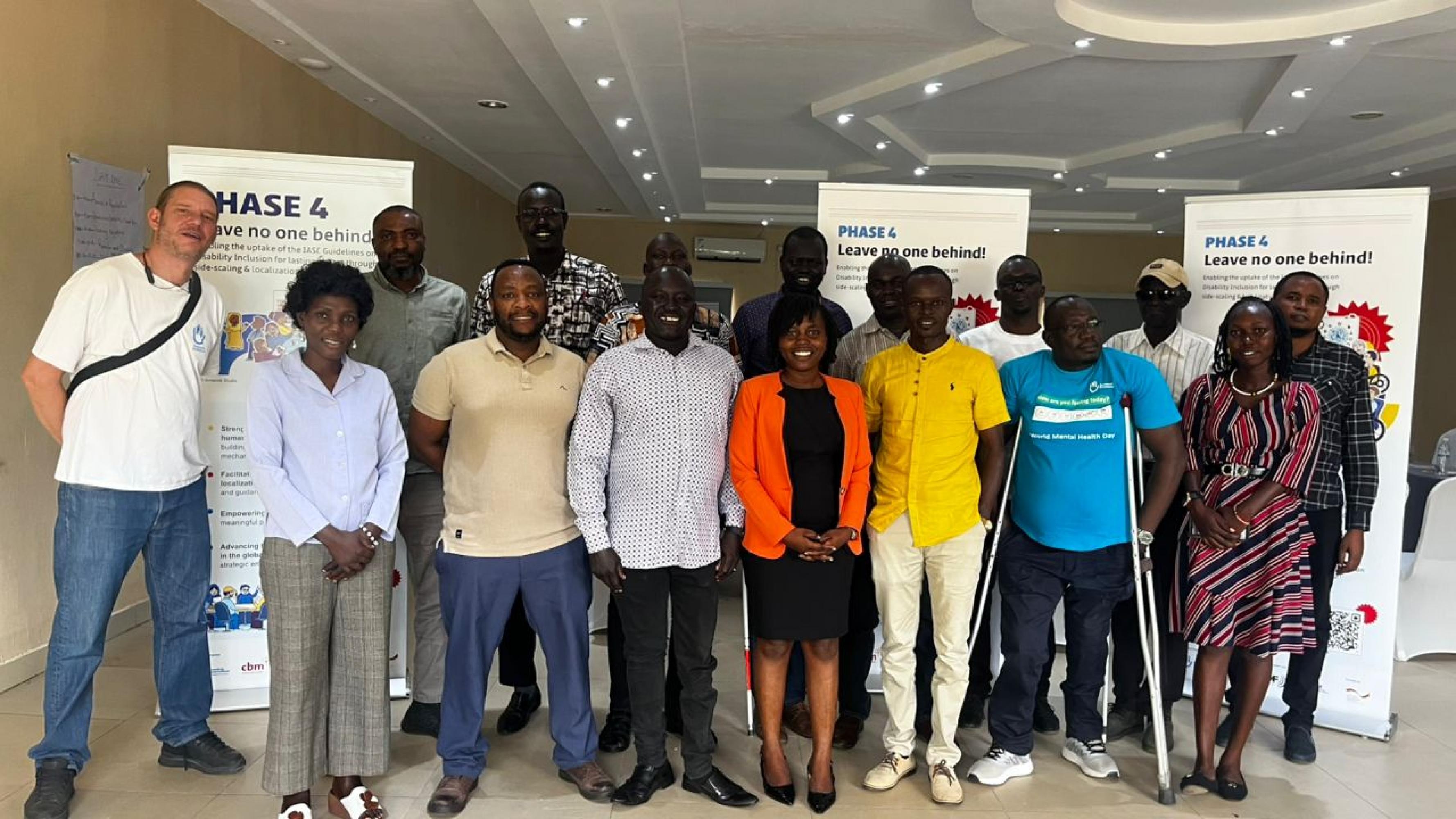 Participants pose for a group photo during inclusive coordination training at Regency Hotel-Juba, South Sudan on 18th September 2025 © Janet / HI, South Sudan.