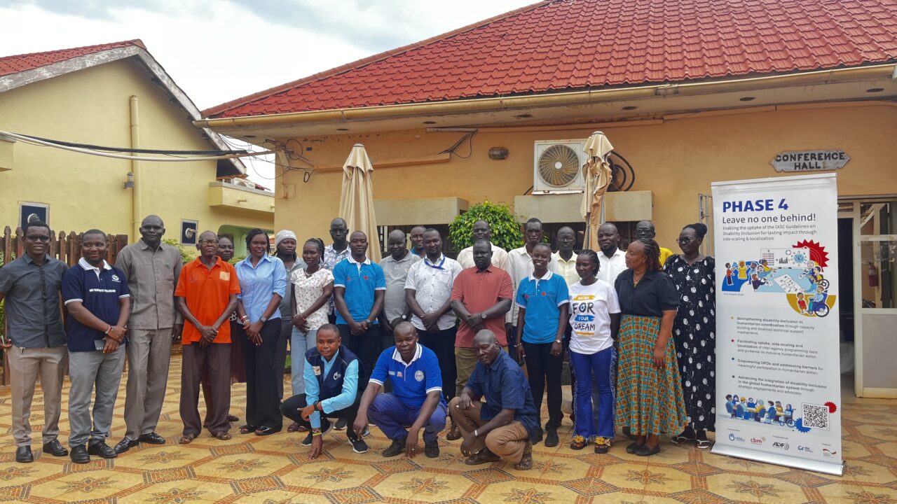 Participants pose for a group photo during the inclusive WASH RAAL-lab training at Universal Hotel- Wau, South Sudan © Seppora/ HI, South Sudan.