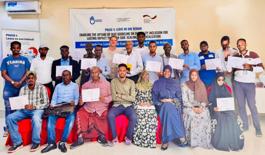 participants and facilitators group photo pose during Inclusive Coordination training in Maansoor Hotel, Hargeisa, Somaliland © Amal Abdilahi /HI