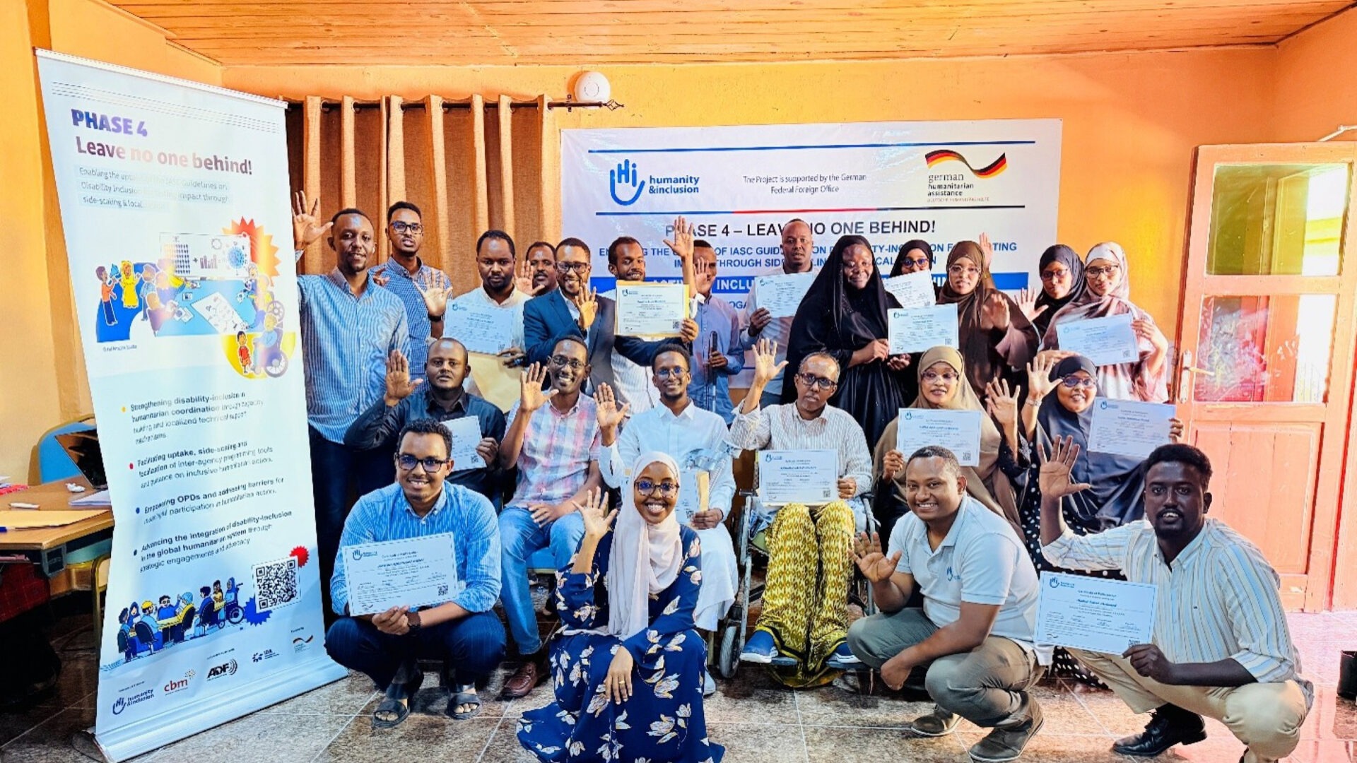 Participants and facilitators posing for a group photo during Inclusive Food Security Training, Peace  Hotel, Mogadishu, Somalia
