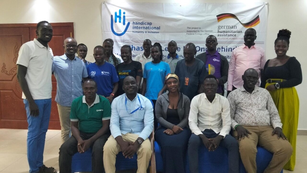 Participants posing to camere during Phase 3 project closure workshop in Juba South Sudan.